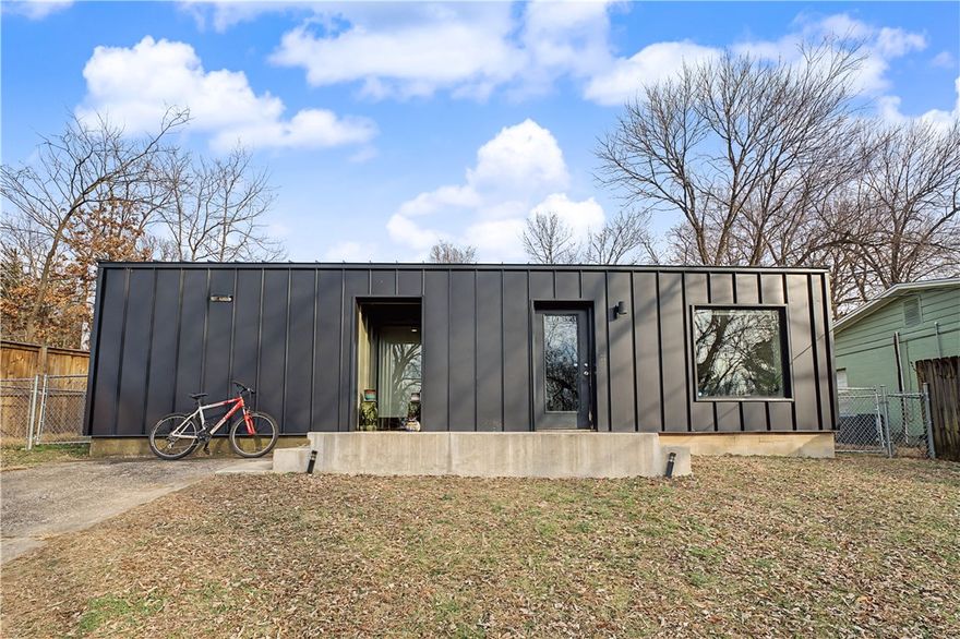 A rare opportunity to own this small, but modern home nestled at the foot of Mt Sequoyah. The completely updated two-bedroom home is full of natural light and low maintenance living. The open floor plan and large windows make you feel like you are in the middle of nature rather than walking distance to downtown Fayetteville and the University of Arkansas. Custom cabinetry and crips tile flooring throughout! This home is a true gem in beautiful Northwest Arkansas.