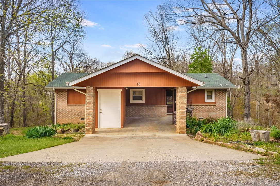 Nestled in the desirable Bella Vista community, this charming 2 bed, 2 bath home sits on a scenic 0.3-acre lot. Inside, youāll find natural oak wood flooring in the living and bedrooms, updated stainless steel appliances, and a cozy gas fireplace. The split floor plan offers privacy to primary ensuite and guest bedroom with full bath adjacent. Refrigerator, washer, and dryer all convey with an accepted offer! Enjoy access off the living room to a covered deck with wooded views. You're just steps from "The Ledges Trailā, only blocks from āBack 40 Trailā, and 5-minute drive to Metfield Park with access to golf, swimming, tennis, and more. Home features dedicated mountain bike storage closet! Finished room in the crawl space provides valuable storage space. Located in the Bentonville School District, quick access to Pea Ridge, and downtown Bentonville (less than 20 minutes away), this home offers both convenience and peaceful, nature-filled living. Donāt miss your chance to call this private wooded retreat your home!
