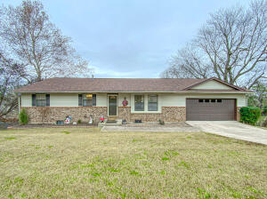 To say this house is move in ready would be an understatement. It is beautiful!! You will get 4 bedrooms and 3 bathrooms all with a fenced in back yard and screened in deck. This home is well worth the look. New kitchen appliances in the last 5 years, tile in Kitchen, granite countertops, roof is 4 years old, along with the garage doors and windows. Alternative heat in basement. Every inch has been updated!! Don't miss this one.