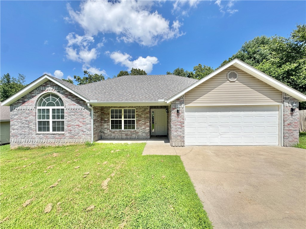 Welcome to this beautifully remodeled 3-bedroom, 2-bathroom home located in the desirable Bella Vista, AR. This home is brimming with new features, from fresh paint and plush carpeting to modern appliances, all designed to provide a comfortable and stylish living experience. The spacious master suite is a true retreat, offering ample space for relaxation. The home also boasts a new roof and water heater, ensuring peace of mind for years to come. The 2-car garage provides plenty of storage and parking space. Step outside to the expansive fenced backyard, a perfect spot for outdoor activities or simply enjoying the fresh air. This home is a perfect blend of comfort, convenience, and modern updates. Come and experience all the newness this home has to offer!