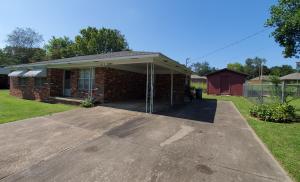 Roof less than 4 years old. Brick 3 bedroom, 1.5 bath near school and just minutes to Russellville. Good starter or rental home. Has a fenced in garden area. Storage building to keep things in the dry (could use new floor). Refrigerator, range, and large chest freezer convey. Should qualify for any loan type.