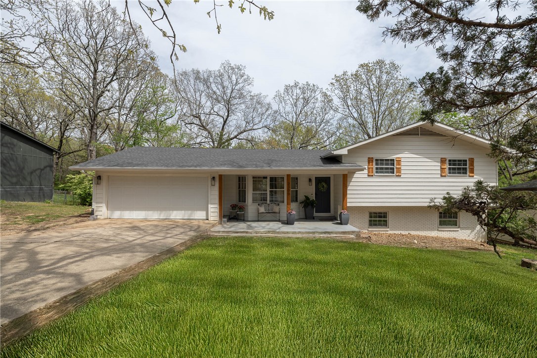 Fayetteville gem! This home truly has it all. Recent updates feature beautiful quartz countertops, wood laminate flooring, and a fantastic walk-out basement area that serves as a bonus room with a large, cozy fireplace. With 4 bedrooms, 3 full bathrooms, and a dedicated office, this property is perfect for any family. It boasts a huge backyard with 2 decks, and the HVAC system was replaced in 2022. Bonus: This home is already city-approved for Airbnb useāthe buyer simply needs to apply to transfer the permit. Whether you're looking for your forever home or a smart investment, this one checks every box!