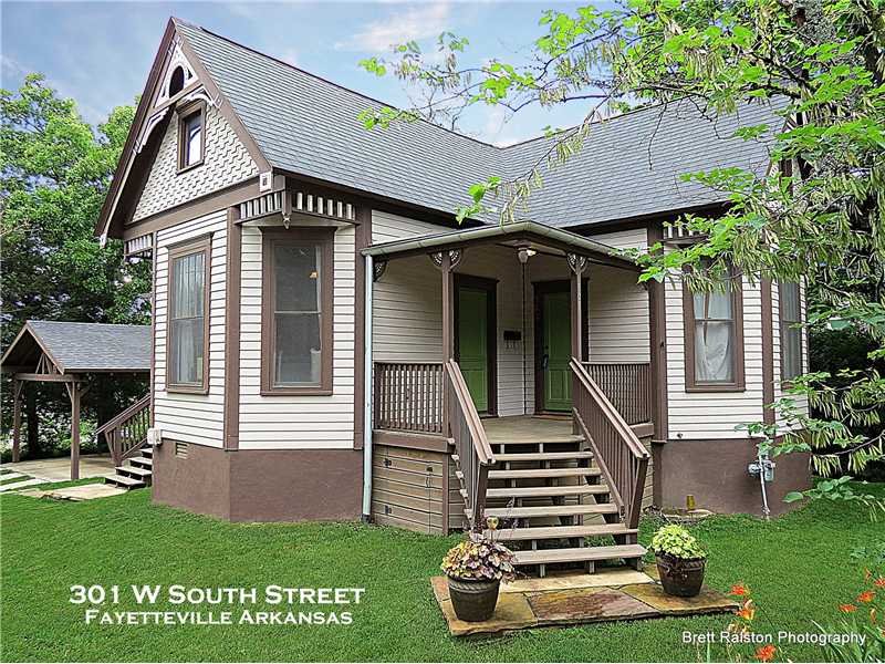Victorian charmer totally rehabbed by Hammer & Chisel, Inc in 2010. Features incl hardwood floors, stained glass, subway tile, butcher block counter tops, under cabinet lighting in kitchen, 2ned living area bsmt w/ walkout to rock patio. Small sewing,nook in basement. 2 car detached carport. Near U of A, downtown & Dickson with easy access to Fayetteville trail system. Entire exterior freshly painted 2014.