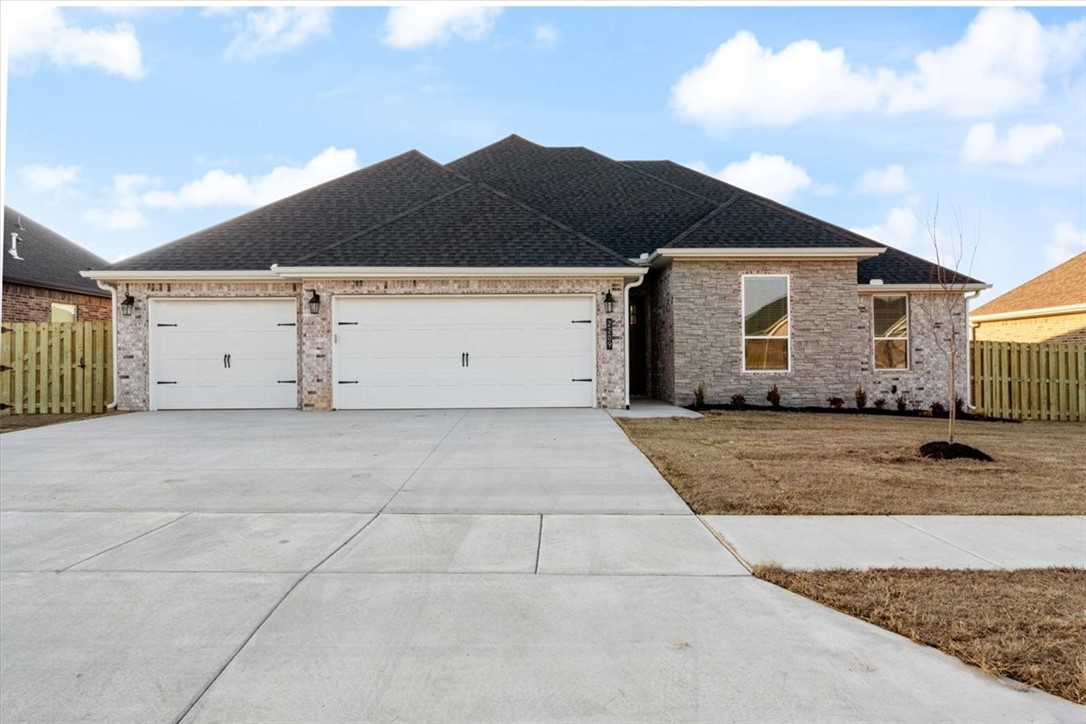 Concessions Include: up to $5000 from the Builder towards closing costs and up to $5000 from preferred lender not to mention get the blinds, fence and gutters included. Welcome Home to Arlington Subdivision in Pea Ridge! Situated directly across AR-94 from Pea Ridge Schools and a short drive to all Northwest Arkansas has to offer. This gorgeous 2,171 plan boasts four bedrooms with two full bathrooms, a powder bath, and generous covered porch. Stained beams, painted cabinets, granite countertops and stainless steel appliances are just a few details sure to amaze. Come by and see all the details!