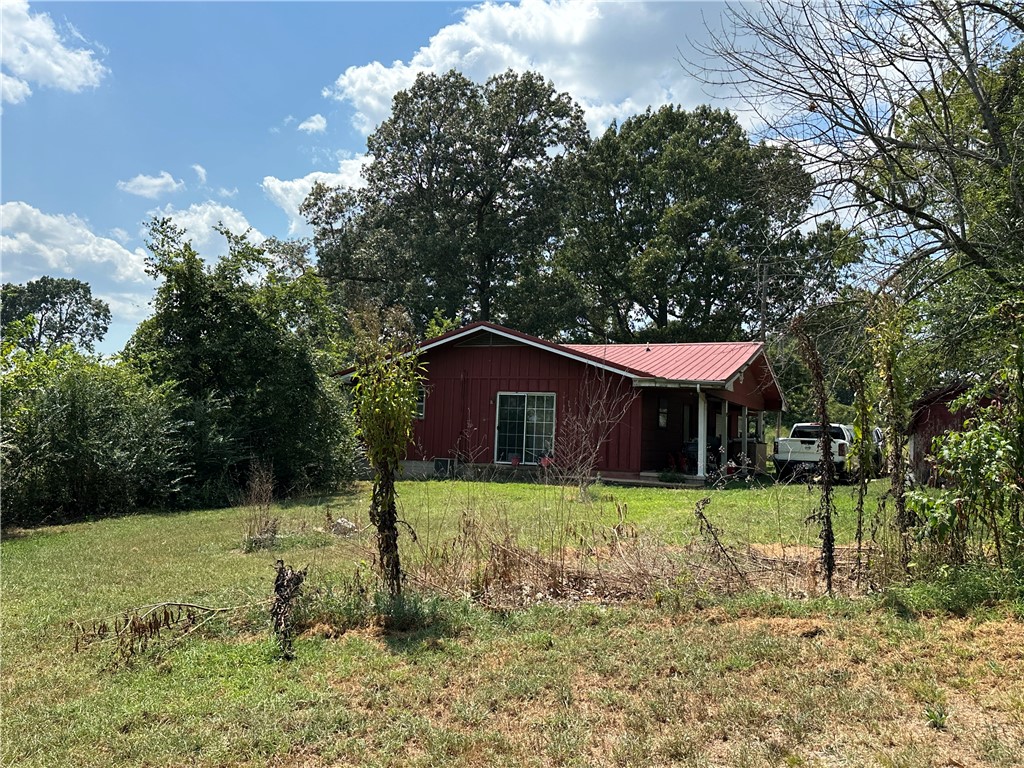Investor Special – 2-Bed, 1.5-Bath on 1.5± Unrestricted Acres with Shop, Garage & Bonus Room!
Just outside Harrison, this solid-bone home is bursting with potential! Featuring a metal roof, one-car attached garage, and a bonus room off the garage perfect for a man cave, hobby space, or office. Inside, you’ll find a classic clawfoot tub, another half bath for convenience, and plenty of room to customize. Outside, enjoy a shop for projects or storage, city water, septic, and an old well that could be put back into service. Central air is in place (currently not working), but the structure is ready for your updates and vision. With 1.5± unrestricted acres, there’s room for animals (even a fenced in yard), gardening, or expansion—plus no HOA to limit your ideas. Priced to move, this is the kind of opportunity investors and DIY-ers dream about!