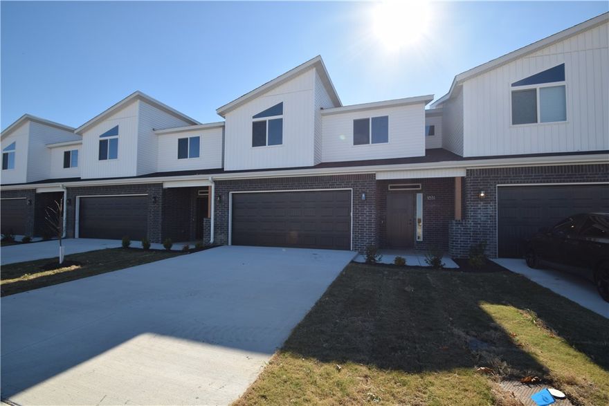 New modern design duplex! Also included brand new side by side stainless refrigerator, washer and dryer. This 4 bed 3 1/2 bath plan has an open living concept with tall ceilings and tons of natural light. Kitchen has granite countertops with , stainless appliances, a large pantry. Primary suite is on the main floor and has a beautiful walk-in shower and a large walk-in closet. Three bedrooms upstairs with 2 full baths. Luxury vinyl flooring in downstairs. 2" faux wood blinds and extra storage in the upstairs attic. Property has a private back patio and wood privacy fence. Owner must approve pets and no smoking.