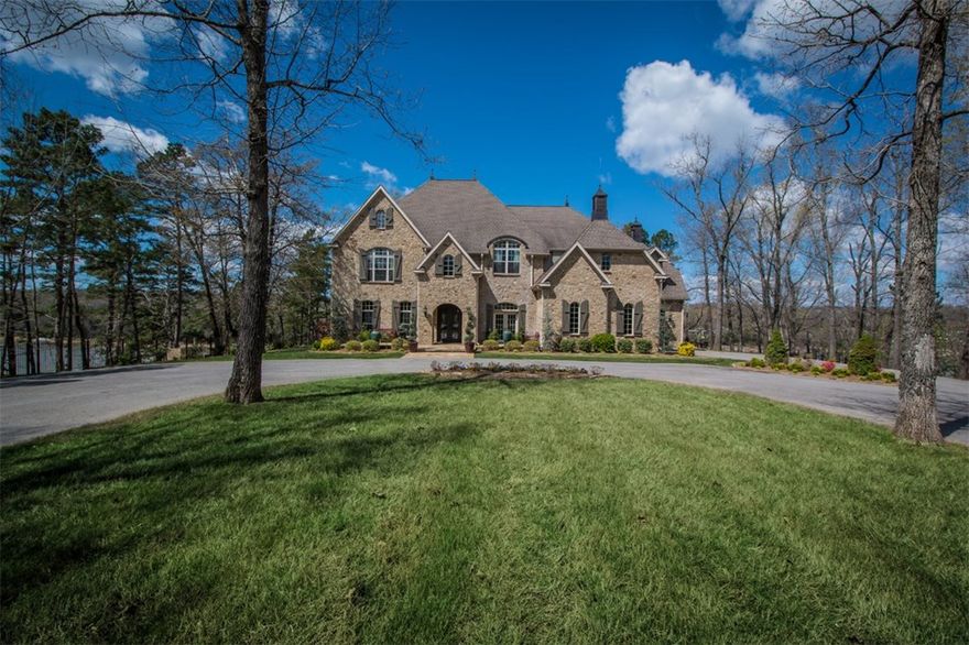 Unbelievable legacy property on 46 acres overlooking Beaver Lake! This centrally located (<20 min to either Bentonville or Fayetteville) gated estate offers a luxurious 6500 sqft main house w/5 large bedrooms, each w/en-suite bath & walk in closets, a beautiful 1300 sqft second home/guest house, 6 bay private, enclosed boat dock w/swim deck, kitchenette & storage closets, steel barn workshop w/bathroom, manicured grounds, salt water pool, hot tub & unsurpassed lake views you will not find anywhere else!