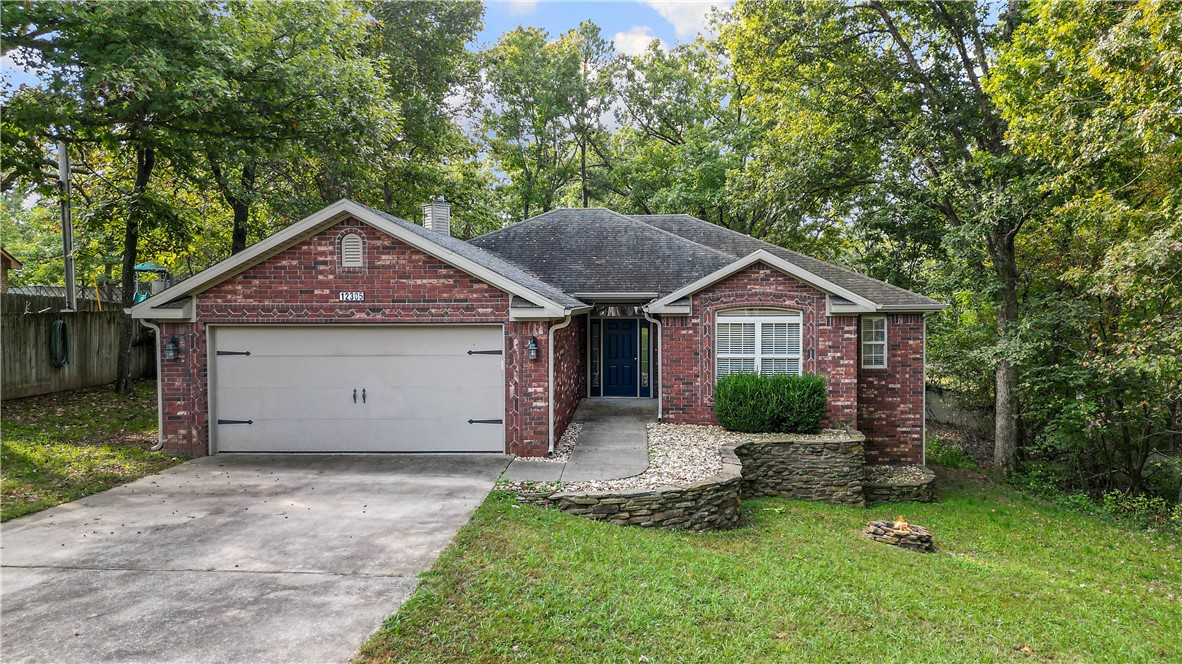 Looking to be surrounded by nature, be close to Beaver lake and close to all the amenities? This move-in-ready home is it! This home sits on a 0.80-acre lot just minutes away from the lake.
Step inside to a newly painted home with a cozy fireplace, new fixtures, walk in closets and more.
The garage door and garage walls are insulated as well. Stainless steel appliances with new stove.
Enjoy your morning coffee on the back deck surrounded by nature and feel the comfort and privacy of this home.