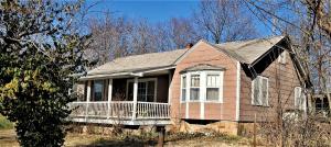 This is a solid, clean home with great character sitting on a large corner lot. There is over 1500 square feet of living on the main floor with hardwood floors and a neat kitchen. All kinds of charm in this house. It's a fixer upper to some extent cosmetically but if you are looking for a house with great character, with a neat footprint and is also solid, this is it.