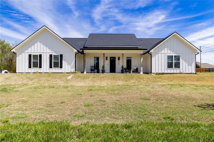 Built in 2023 and sitting on 2.49 peaceful acres, this 4-bed, 2.5-bath custom home with a dedicated office is the kind of place that makes you forget the city exists — until you realize you're a 4-iron from Stonebridge Meadows Golf Course.
Inside, you'll find polished concrete floors, quartz counters, high-end appliances, a farmhouse sink, and a butler's pantry that earns its keep. The split floor plan gives everyone breathing room. The primary suite features a soaker tub, tiled shower, and a laundry room that connects directly to the closet — because that's just smart design.
The oversized 2-car garage is insulated with epoxy floors, the attic is pre-engineered for a future second story, and a Nest thermostat keeps things dialed in. Out front, a big covered porch. Out back, a covered patio with a TV and hot tub ready to go.
County quiet. Modern everything. Room to grow.