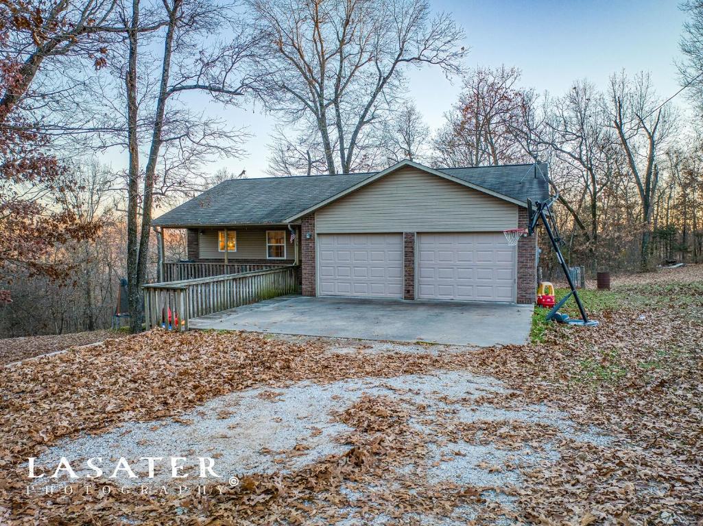 Beautiful 4 bedroom, 3 full bathroom home situated on 1.23 acres m/l that is in a great location in the Bergman school district! The home features more than 2,500 square feet of living space that includes; laundry hookups on both levels, spacious bedrooms, an open floor plan, fresh paint throughout, a custom game room, the basement has 2 BR and 1 BA and all tile or concrete floors, there is a fenced area of the backyard for pets and kids, covered front porch, back deck with mountain views and an extra spacious 2 stall car garage. The home is located just off pavement - no dirt road, has large trees and was built in 2010. Come take a look!