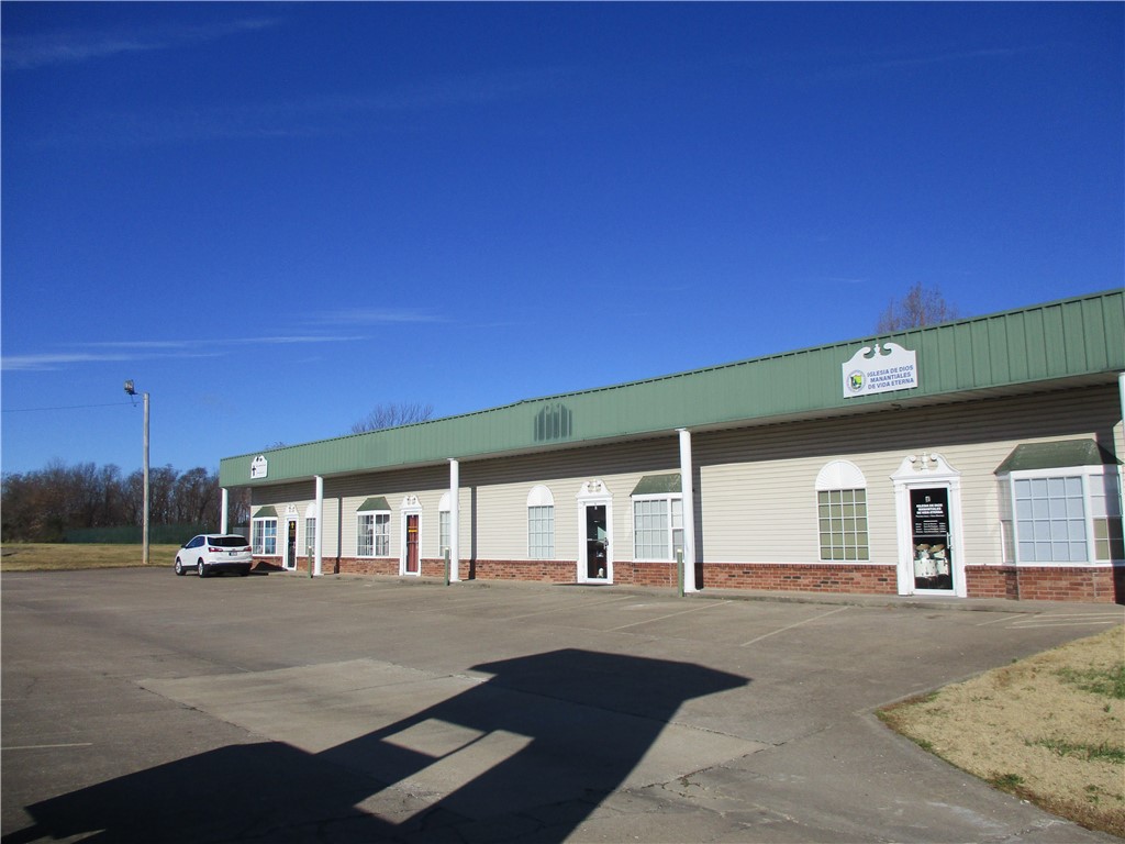 Three commercial buildings on 3.13 acres! Each building has four units with room for a fourth building to be built on the property. Accessible direct from Hwy 412 or from Carl Street. Each building is all electric, tenants pay their own utilities, owner pays for dumpster, electric on signage and for security light. Good rental history