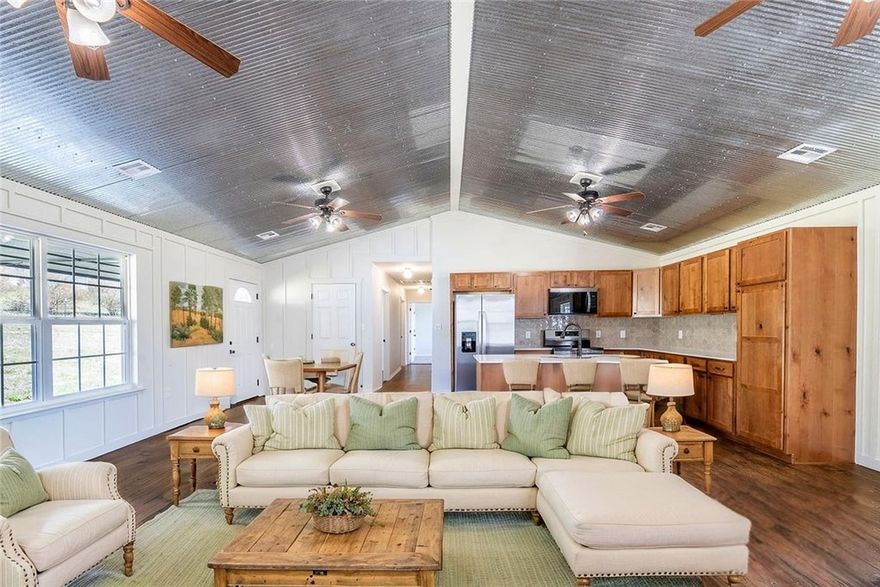 Welcome to this peaceful hilltop home just off Blue Springs Rd, right next to Beavorama community. A place where you can enjoy the quiet, nature, and nearby access to Beaver Lake with a neighborhood public boat ramp. This 3 bedroom, 2 bath home sits on over an acre and has been beautifully updated with new paint, flooring, countertops, tile backsplash, and fixtures, making it truly move-in ready. Inside, you’ll find great storage throughout, with several bedrooms offering two closets or more. The attached 2-car garage and spacious lot give you plenty of room for hobbies or simply enjoying the outdoors. If you’ve been looking  for a comfortable, updated home near the lake with space and privacy, yet still close to modern conveniences, this one feels like home the moment you arrive.