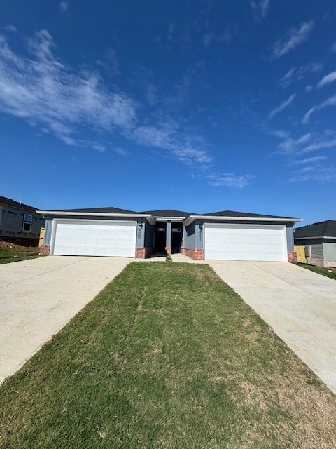 Private Landlord!! Beautiful brand new duplex unit ready for move-in! Don't miss out on this stylish home that features 4 bedrooms and 2 full bathrooms. The large open floor plan provides a great place for entertaining friends or family. Updated finishes include LVP flooring and granite countertops. Brand new appliances including a refrigerator, washer, and dryer have also been installed. No carpet in the home makes clean up a breeze. The backyard is fenced for privacy and the two car garage keeps your vehicles safe from the elements as well. Plenty of storage throughout. Ready for a quick move-in. Applications will be reviewed on a case by case basis.