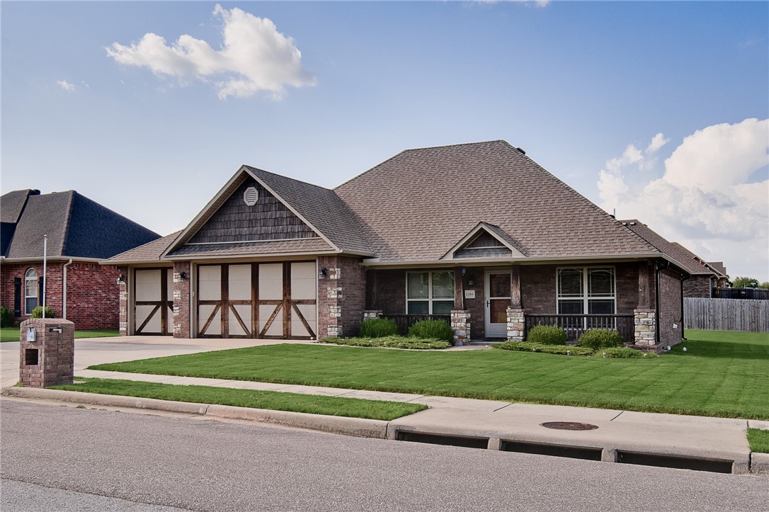 This is a great well-maintained home on a corner lot. Lots of extras, 3 BR, 2 BA, split floor plan, fireplace in the living room. Many unique features like the screened-in back porch. 3-car garage with a large storm shelter. 8x12 storage building, too. Agent owned