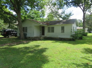 QUAINT COTTAGE IN A GREAT LOCATION! This little jewel from yesteryear has loads of potential! All rooms are spacious! Very nice corner lot! Priced to sell quickly!