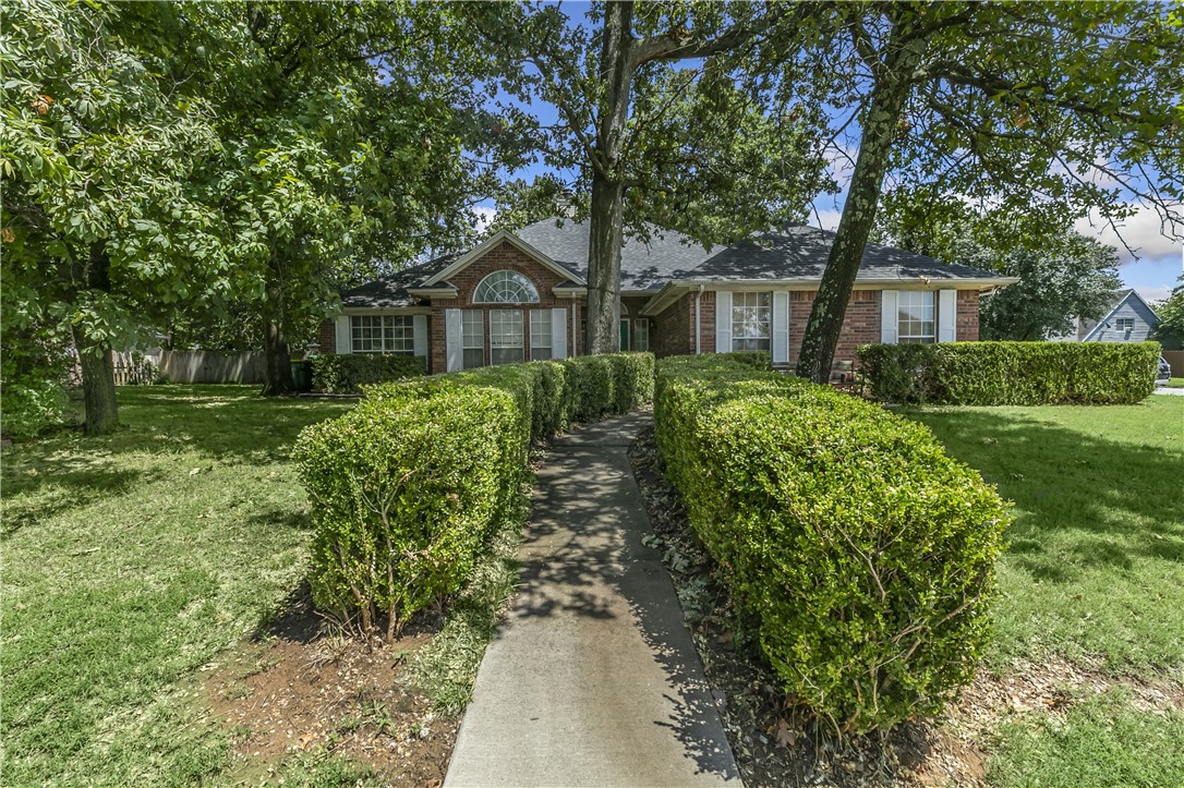 Welcome To Your Next Home! Spacious 4 Bedroom On Large Corner Lot In Great Location Close To Essentials And With Greenway Bike Trail Right Out Your Front Door. New Roof And Newer HVAC. Big Living Area w/ Fireplace, Master Suite, Kitchen w/ Plentiful Cabinet / Counter Prep Space, Covered Back Patio, Fenced Yard And More! Come See.