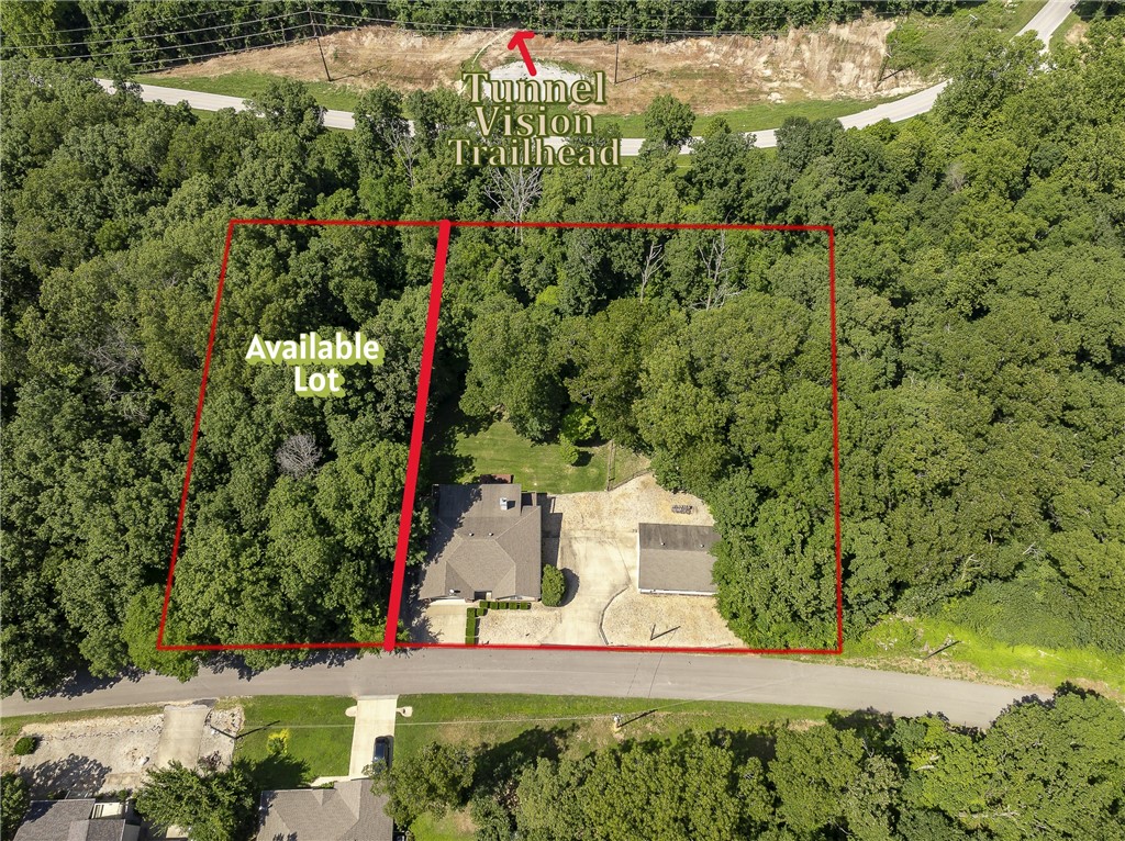 Great building potential on a quiet street. Tunnel Vision Trailhead nearby. Lot Boundaries are approximate in photos. Adjacent to 33 Rountree listing.