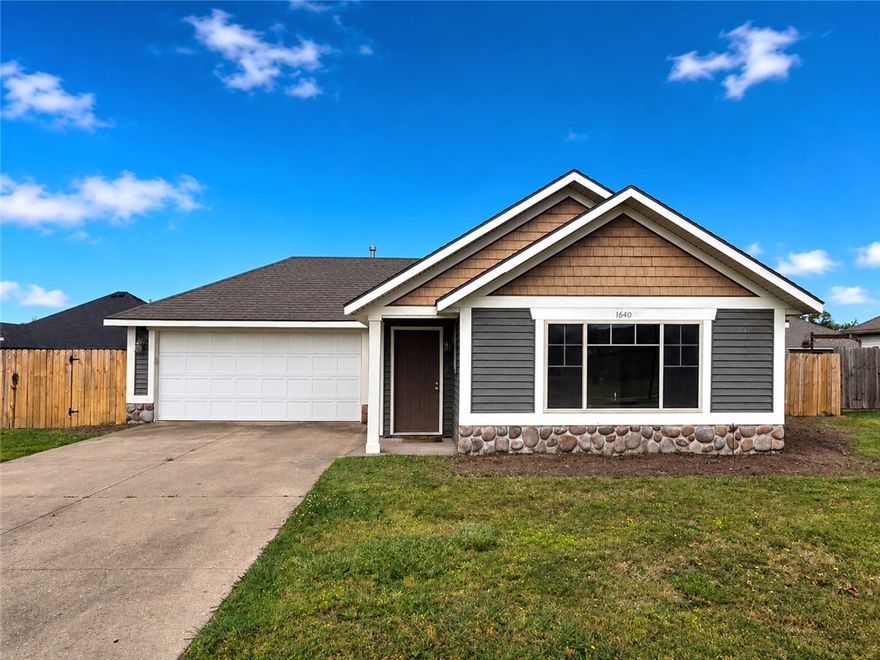 Come see this craftsman-style 3BR, 2BA home with 1,233 sq ft and a 2-car garage in the heart of Prairie Grove! This inviting property features a spacious living area with a cozy gas log fireplace and a comfortable dining space, perfect for everyday living or entertaining. Some appliances convey, making this home move-in ready. Enjoy the nice-sized backyard with plenty of space to relax or play, complete with a privacy fence. Conveniently located within walking distance to Prairie Grove Schools and close to emergency services, shopping, parks, the library, and more. Experience small-town country living just 13 miles from the University of Arkansas.