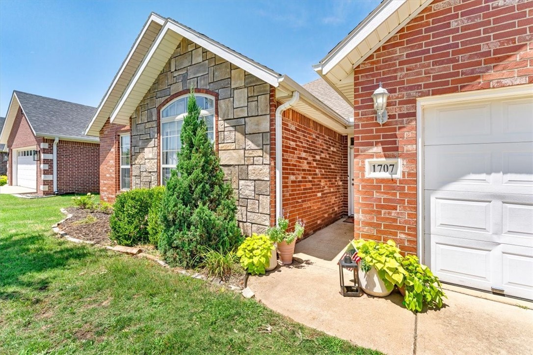 COVETED CENTRAL ROGERS LOCAY. All brick 3/2 home, 1914 sq/ft. Immaculately maintained. So much to offer and only 1/2 mile to jump on the Greenway. One level home with formal dining behind doors that could be used as 4th bedroom, home office, second living, or home gym. Walk-in closets in each bedroom, tankless water heater, sink in utility room, pantry, storm doors, private back yard with patio.