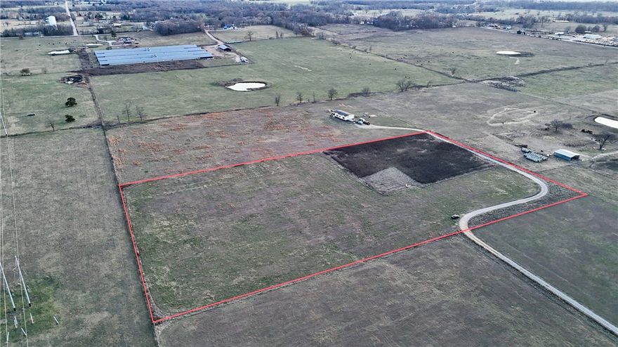 “Discover the perfect opportunity to build your dream home on this Nice 7.55-acre level tract of land! With no deed restrictions, this property offers the freedom to create the space you’ve always envisioned. Electric and water are available at the street, and a septic system will be needed. Don’t miss out on this exceptional property—your dream home awaits!”