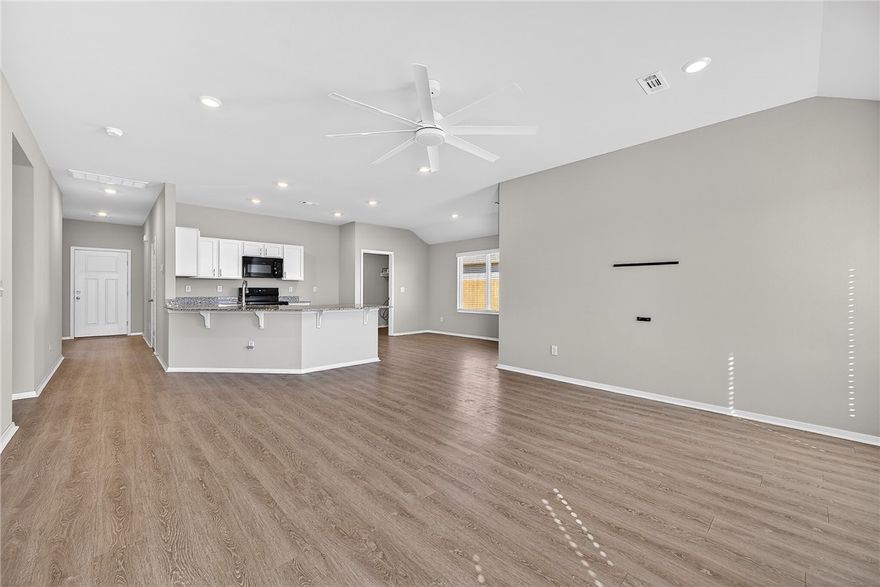 Skip the wait and step into a home that feels brand new, without the added expense. This beautifully maintained Ross plan offers the perfect blend of style, function, and convenience, with upgrades already in place like fencing and window blinds. From the moment you arrive, you’ll notice the charming curb appeal, welcoming covered entryway, and landscaped yard. Inside, the open-concept layout is designed for easy living, featuring a spacious family room that flows seamlessly into the kitchen and dining area, ideal for both everyday life and entertaining.The kitchen is equipped with energy-efficient appliances and generous counter space, creating a functional and inviting space for cooking and gathering. With 3 bedrooms and 2 bathrooms, this home offers comfortable, well-designed spaces for families, guests, or a home office setup.
Enjoy the benefits of new construction without the extra costs or hassle, this home is truly move-in ready and waiting for its next owner.