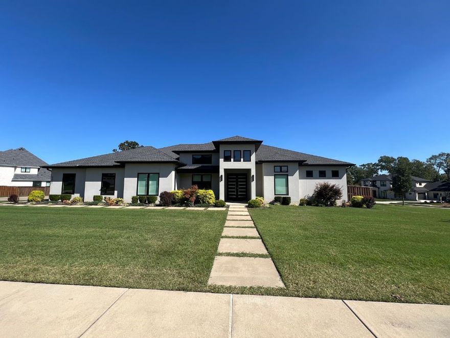 Luxury and function meet in this David Harris custom home in Scissortail. Offering 3,636 sq ft of modern one-level living on a corner lot, this home features 5 bedrooms and 4 baths, with the fifth serving as a state-of-the-art media room with projector and surround sound. The private primary wing includes dual custom closets and a dedicated home gym. A chefās kitchen boasts Bosch appliances, induction range, and quartz countertops, while a spacious office adds flexibility. Enjoy peace of mind with an above-ground storm shelter, whole-home surge protector, smart switches, and Nest doorbell. Thoughtful upgrades include motorized shades, oversized laundry room, and a 16-zone sprinkler system. Experience modern luxury living in Scissortailāschedule your private showing today!