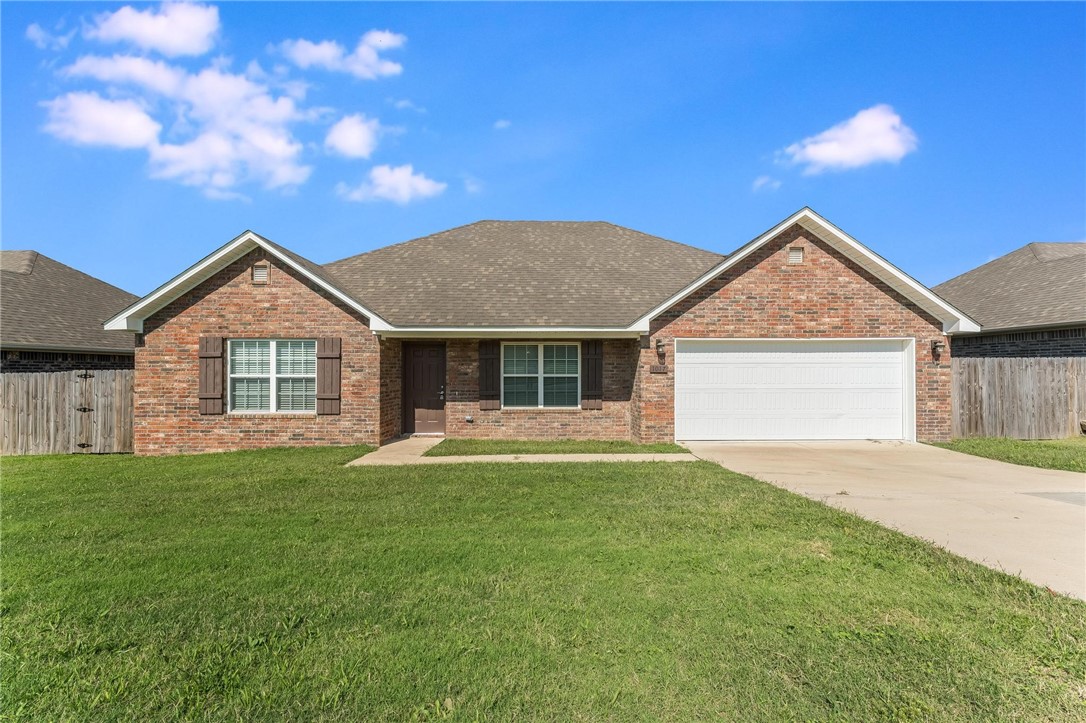 Beautiful country setting conveniently located in the middle of NWA. Located in a Rural Development area, so qualified buyers could move in with NO DOWN PAYMENT! Come see this beautiful 4 bedroom, 2 bathroom home on one-third acre lot. Move into 1,688 sq feet of practically new construction, Split floor plan. Beautiful dark stained cabinetry and flooring provide a sense of elegant living throughout the home. Attached 2-car garage and ample closet space in each room. These homes include: granite counter tops, Full Blinds, Stainless steel appliances: Range, Dishwasher, Microwave AND Refrigerator! Plenty of room to entertain inside and out! Make an appointment to see today!