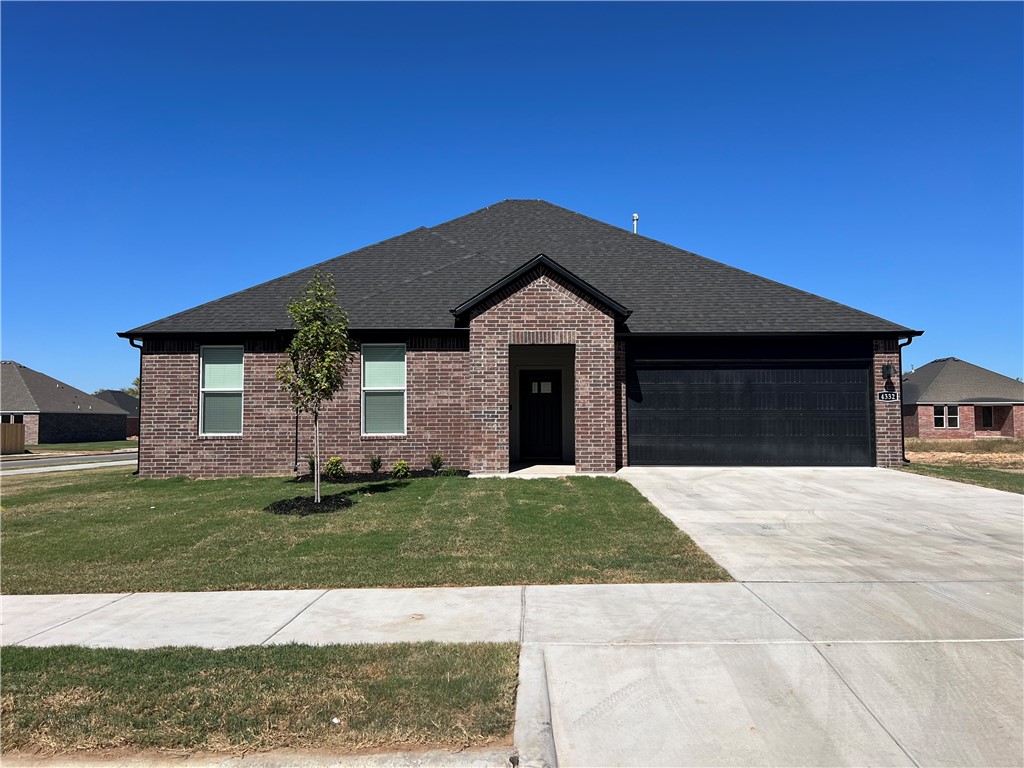 Sold before print. Charming Coleman Plan in Brentwood Village, located in Springdale, close to the C.L. "Charlie and Willie George Park that consists of walking trails, dog park, splash pad, ball fields, and tennis courts close to the Don Tyson Parkway, near the highly sought-after Don Tyson School of Innovation and other schools. These brand-new homes will be 4-sided Brick! Living room will showcase a beautiful and modern Electric Fireplace with Poplar Mantle. Home will have LVP and Carpet. Kitchen will have 42-inch cabinets, lovely appliances and quartz countertops and tile backsplash. Ceiling fans in Bedroom one and the living room. Primary bedroom has a fabulous en suite with an oversized walk-in shower and elongated commode. LED lighting throughout. High efficiency AC with programmable thermostat. Come find your dream home today! Taxes and Parcel TBD.