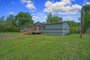 Full Remodel!! Check out this double wide mobile home with a brand new Roof, new Kitchen and cabinets, Floors, Siding, Sheetrock, Underpinning, Bathrooms, Water Heater, and front and back decks. Handicap accessible with 5 bedrooms, 2 full baths and 1884 sq ft heated and cooled. Will go FHA with permanent foundation straps.