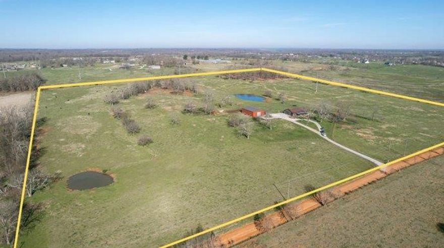 Fantastic 40 Acre developmental potential property off Vaughn Road in Bentonville. One parcel 40.09 Acre property, with two ponds, wooded and pasture areas with city water and electric on site. Prime location surrounded by new and upcoming residential developments. Easy access to Regional Airport and 102. 3 Bed/2 Bath home on property. Don’t miss out on the opportunity to own this Bentonville property, abundant options whether agricultural, developmental, or personal! Red metal building on property does NOT convey along with additional list of items, see attached. Value is in land. Home to be shown only after accepted offer.