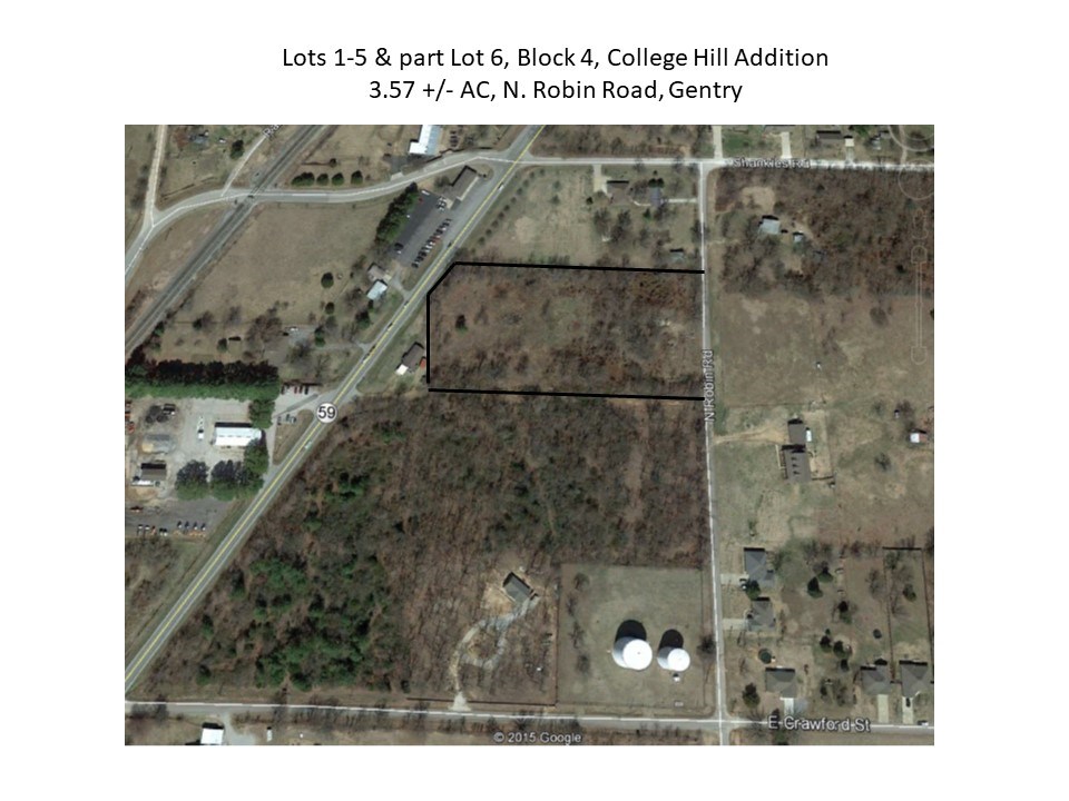 3.57(+/-)AC. This acreage has 96.4 feet of frontage along Hwy. 59 and also frontage on Robin Road. With 597 feet of depth from the Hwy to Robin Rd there is the possibility of commercial and residential use.