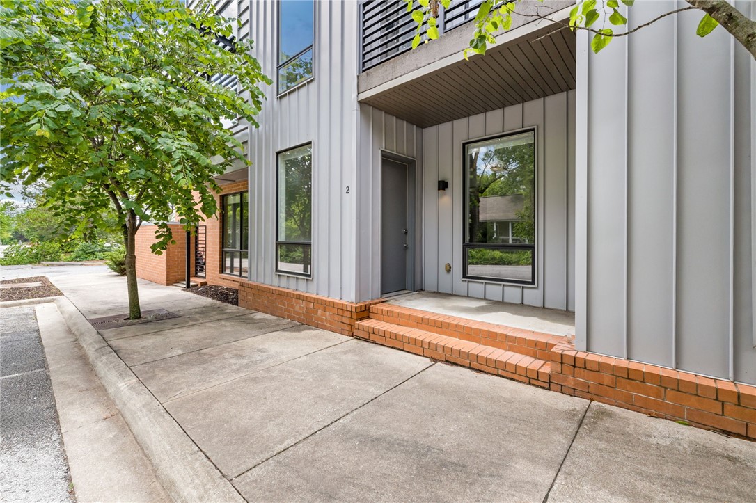 Fabulous condo for rent in the heart of South Fayetteville and the Cultural Arts Corridor. Close the the Razorback Greenway trail, shopping, dining, Fayetteville library, Fayetteville Square, and the U of A. It doesn't get much more convenient than this location! This condo has 1 bedroom, 1 bathroom, huge walk-in closet, stained concrete floors, with charming finishes throughout. The open floorplan offers many possibilities to make this space functional for your life. Large windows on the front of the building offer lots of natural light and paired with very high ceilings, this space feels very open, bright, and inviting. The kitchen has a large island, granite and metal countertops, & great cabinet space. The bathroom is darling with the black and white tiles in the tub/shower combo and a washer and dryer. No need to worry about parking, you can park on street or in the dedicated paring lot. Furnishings and pets are negotiable.