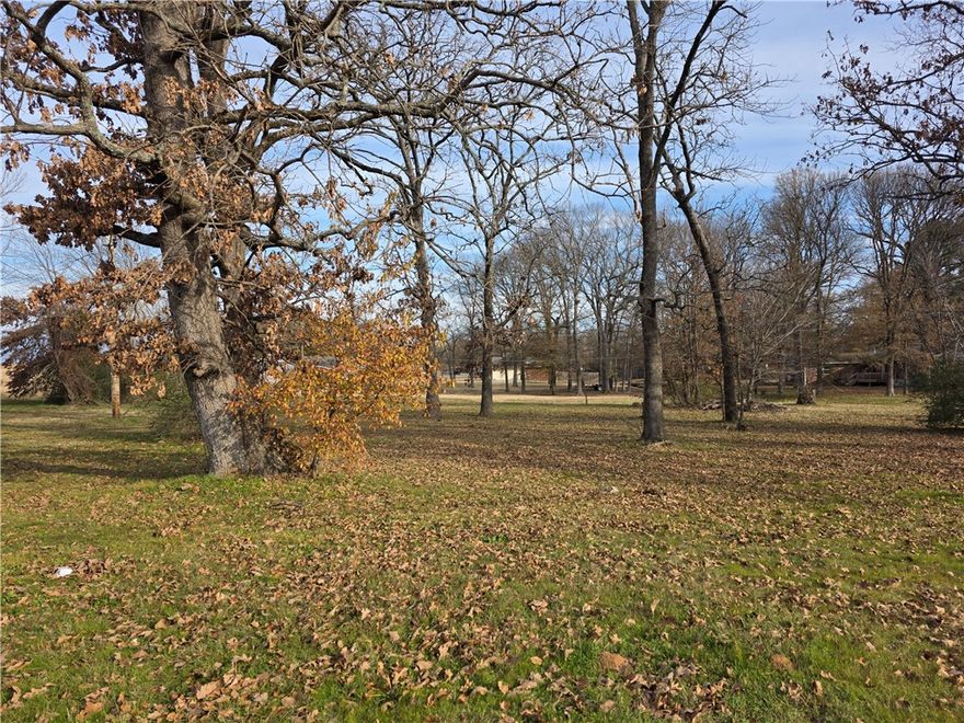 Prime Commercial Lot on Hwy 22 – Charleston, AR Excellent opportunity to acquire an undeveloped commercial lot located on Highway 22 (Main Street) in Charleston, Arkansas. This highly visible site is diagonally positioned across from the local school and is conveniently located near established businesses, offering strong exposure and accessibility in a growing small-town market. With anticipated growth in the Charleston area, this property presents numerous potential commercial uses, making it an attractive option for investors or business owners seeking a strategic location. Two additional lots  provide the opportunity for expanded development. Lot dimensions and acreage  are approximate; buyer to verify all measurements. Buyer is responsible for all due diligence regarding utility access & service connections. ARDOT ingress & egress requirements should be verified directly with ARDOT. Mineral rights do not convey. Don’t miss this opportunity to secure a prime commercial site along Charleston’s main corridor.