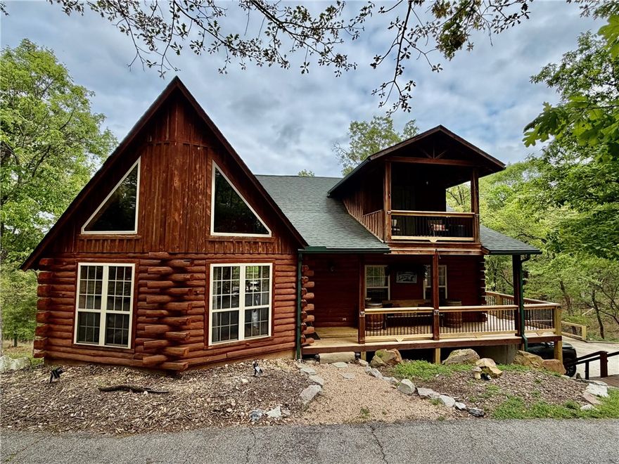 Multi-level home. Two levels finished and heated 1838 sq ft. Plus-walkout basement heated and partially finished with full bath. 4.65 acres / 2 car garage / 3 bedroom / 3.5 bath. This is a two-level log home. It boast plenty of natural light with many large windows. The main bedroom is on the main level, and two guest rooms are located on the second level. The interior boast elegant wood floors, tongue-and-grove cedar wood paneling in the great room, and a spacious vaulted ceiling. This home features four decks overlooking the woods. Set and watch the deer while drinking your coffee. Nestled in the heart of the Ozarks, this property offers unmatched access to some of Northwest Arkansas' most sought after outdoor attractions. Located just 10 miles from Eureka Springs, you'll enjoy fine dining, unique shops, and weekly entertainment in one of the regions most charming towns. For water and natures enthusiasts, Beaver Lake and Dam is only minutes away. Fish the White River. This is truly an outdoorsman  paradise.