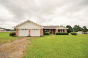 Custom Built Home on 2 acres in Charlotte Acres! Beautiful 3 bedroom, 2 bath home with 2 extra bonus rooms on either end of the house for loads of storage or just a fun place for the kids to play. This home features cathedral ceilings in the main living area, open concept living, split floor plan, and 6" exterior walls. Master Suite includes a separate garden tub and shower, huge walk through