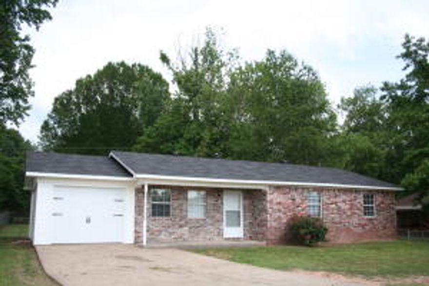 Like new 3 bedroom 2 bath home with garage and partially fenced backyard. Check out the new tile and carpet. Open Living, kitchen and dining. You will enjoy living in this home. New range to convey.