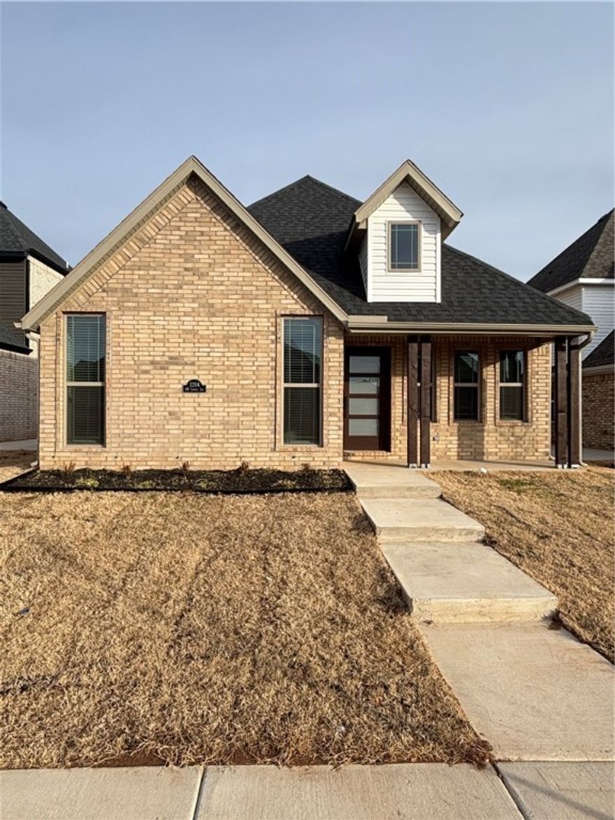 Brand new South facing full brick home. 5 bedroom or 4 bedroom with an office. Large living area with fireplace, vaulted ceiling, granite counter, gas range, washer, dryer, fridge and privacy fence included. Get it before it's gone!