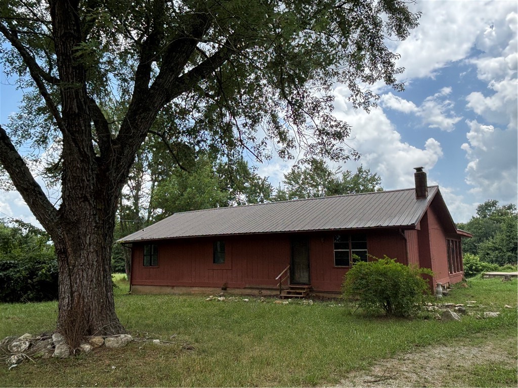 Welcome to Opportunity in the Ozarks! Located in Eureka Springs, outside city limits, await a DIY'ers Dream. This 2 bed, 2 bath house sits on 2 parcels totaling 1.45-acres of Unrestricted property in rural Carroll County, just minutes from historic Eureka Springs. The existing structure is in need of some TLC and IS READY FOR YOUR VISION! Brand new private well, new pump, and pump house have just been installed. NEW HVAC AND APPLIANCES!
Electric and water connected and ready for use. Stainless steel kitchen appliances included,
Bonus enclosed sunroom for added living space or storage
Existing structure on-site offers potential for renovation or rental opportunity.
There is ample space to add additional structures such as cabins, workshops, RV sites, or tiny homes (buyer to confirm with county planning office). Properties like this won't last long.
Don't miss this opportunityāimproved unrestricted properties with a NEW WELL are rare in this area.
Hurry and schedule your showing today, before it's gone!