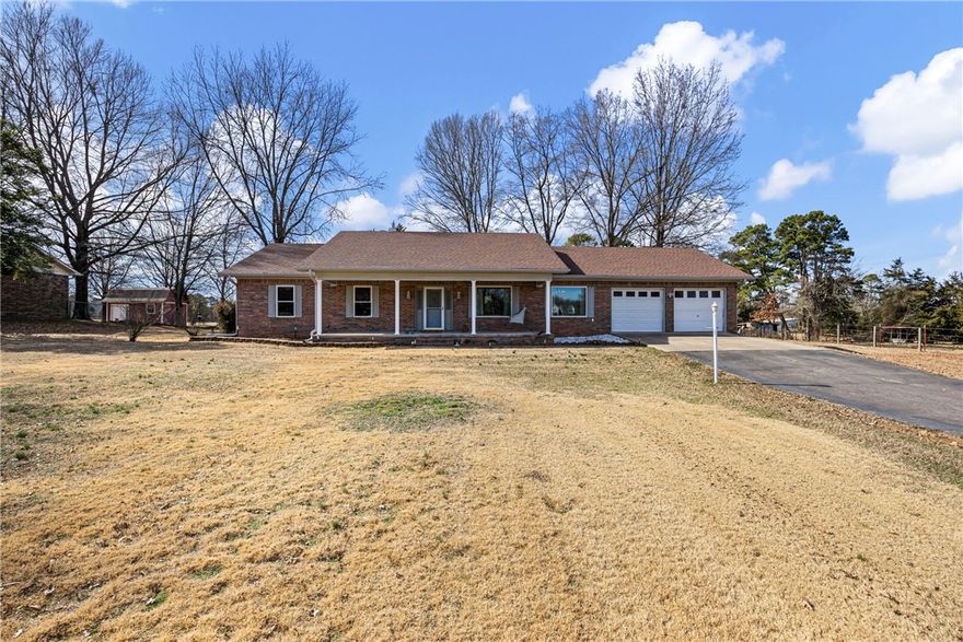 Rare opportunity! Nestled on 9.47 acres, this home is perfect for a hobby farm or endless possibilities. Featuring newer windows, floors, roof, storm shelter, and sunroom, and many other updates, it’s just minutes from I-40 and shopping, offering both charm and convenience.  Workshop just 4 years old and insulated, storage shed and metal equipment shed.  ****AGENTS SEE REMARKS****