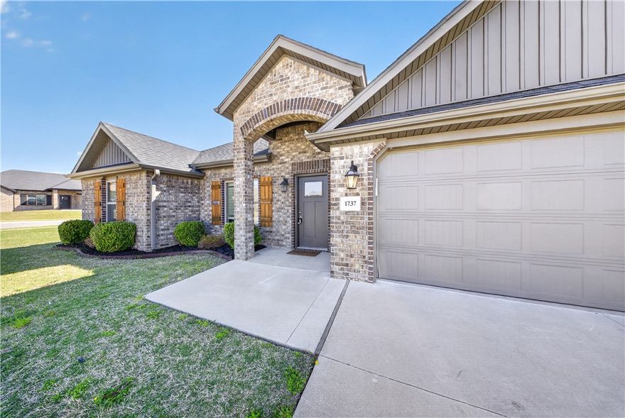Welcome home to this beautifully updated property in Prairie Grove’s desirable Belle Meade Subdivision! This move-in ready home features granite countertops in the kitchen and both bathrooms, brand new carpet in all bedrooms and closets, fresh interior paint, and luxury vinyl plank flooring in the kitchen, living room, baths, and utility room. Enjoy a spacious 2-car garage, large corner lot with oversized side yard, covered front porch, and covered back patio—perfect for relaxing or entertaining. Inside, you’ll find a split floor plan, gas fireplace in the living room, corner pantry, extra laundry room storage, and an open eat-in dining and living area. Privacy fenced backyard. Conveniently located near Prairie Grove’s waterpark, historic downtown, restaurants, parks, and more! Ask about preferred lender credits available with this home!