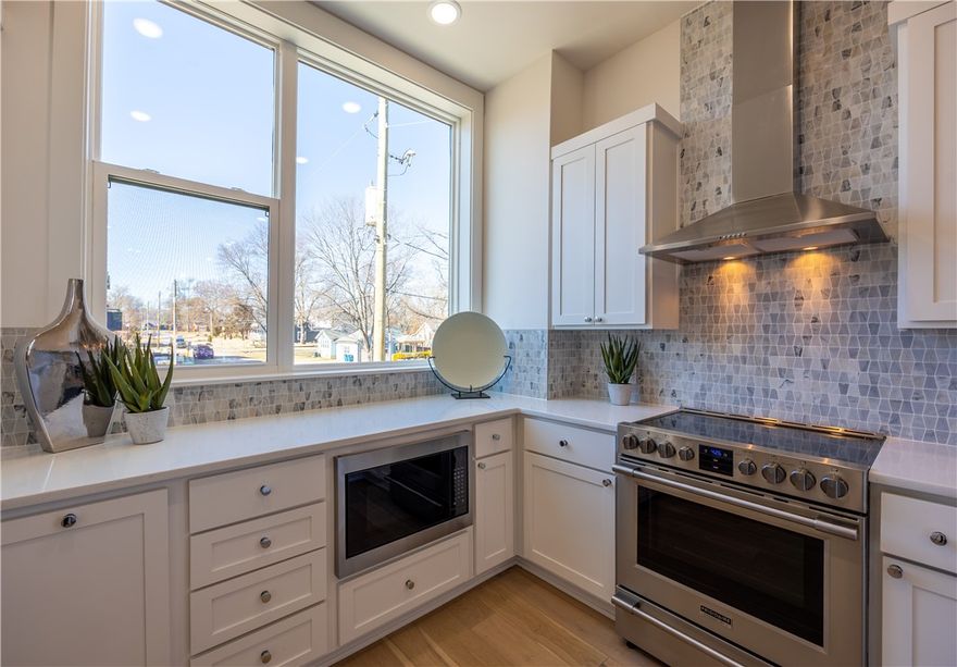 In the heart of Downtown Bentonville - prime location in the downtown core. This townhome boasts a variety of amenities such as hardwood flooring, architectural detailing, covered outdoor patio, slab quartz countertops, tile backsplashes, full tile showers, stainless steel GE appliances, and a single car garage. Furniture, Samsung TVs, mounts, Sonos Sound Bars + Amplifiers, and EV Charger included. 

Walking distance from Walmart home office, Bentonville Square, Crystal Bridges, the Momentary, 8th St Market, and right next door to Skylight Cinema.