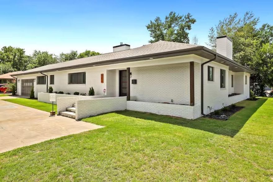 Stunning, one-of-a-kind home ideally located at the doorstep of Downtown Springdale, blending style & investment potential. A welcoming entrance opens to a dining room with fireplace and leads to a gallery hallway. The open-concept living area with second fireplace flows into a large kitchen with quartz island & ample workspace. The layout includes 2 primary suites plus 2 additional bedrooms, each with convenient bath access, and a spacious utility with sink. Situated on a corner lot, the property features a circle drive and a 2-car garage with pull-through capability & extra storage. The fenced backyard includes patios with gas hook-up for a grill & space for entertaining. Minutes from restaurants, shopping, the Razorback Greenway & parks, this home offers exceptional convenience. Currently a successful short-term rental, it is being sold fully furnished, offering a seamless opportunity for investors or buyers seeking a move-in ready home. Home was renovated within the last 3-yrs including new roof in summer 2025.