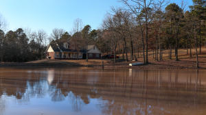 First Time Offered! Oak Valley Farm less than 10 minute drive from downtown Dover, AR. Oak Valley Farm features 46 acres of complete peace and tranquility. Meticulously developed over the last 20 years, including natural springs flowing into deep man-made ponds. Open wildlife food plots traverses by stately stands of grand oaks. Over a quarter mile road frontage and you're the only one there. Nearly 2000 square feet of spacious quality construction. Open Floor Plan and a deck designed around the natural atmosphere that makes Oak Valley Farm a special place in God's great landscape. $450,000
