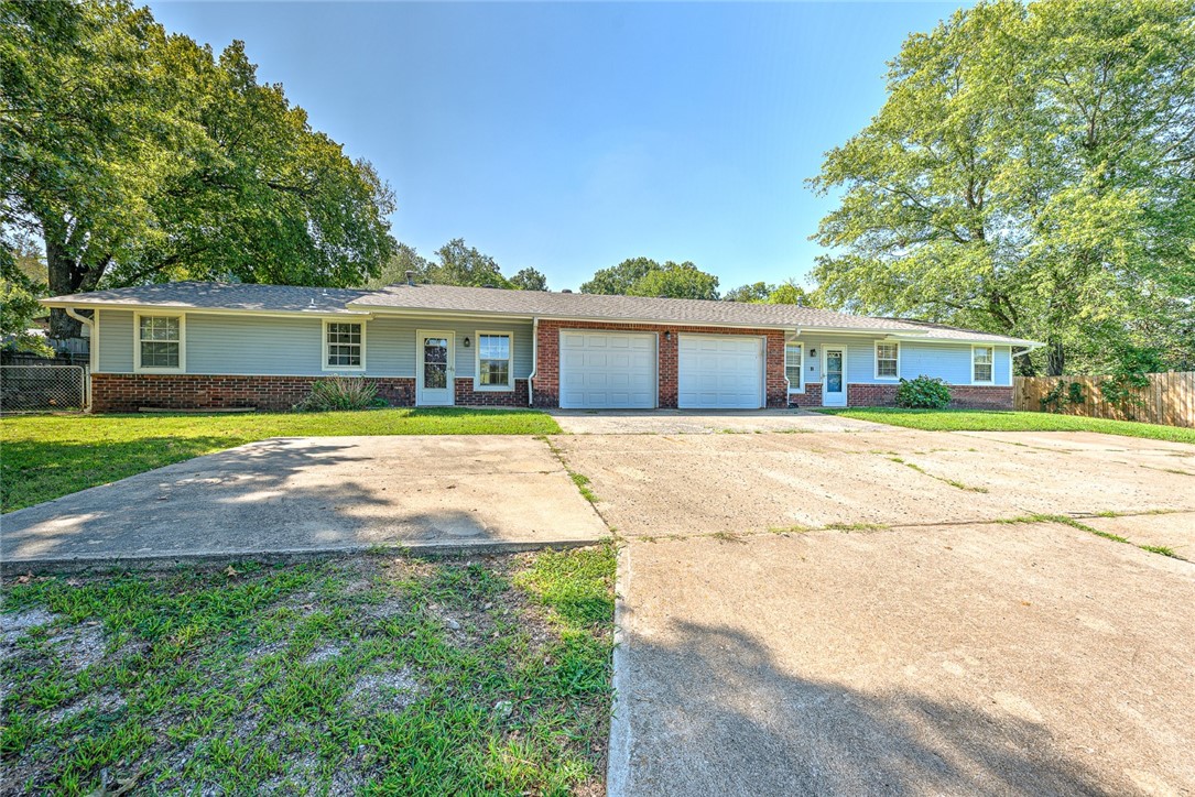 Exceptional Investment Opportunity ā Turnkey Duplex Just Minutes from Downtown Siloam Springs! Don't miss this rare chance to own a fully occupied duplex just 3 minutes from the heart of downtown Siloam Springs. Each unit features 3 spacious bedrooms and 2 full bathrooms with durable hard-surface flooring throughout ā perfect for low-maintenance living and long-term value. Enjoy peace of mind with a new roof (to be installed end of July 2025) and two separately fenced, oversized yards ā ideal for tenants who want privacy or simply love the outdoors. Whether you're expanding your portfolio or stepping into your first income property, this duplex delivers immediate cash flow with reliable tenants already in place. This is a prime opportunity in a rapidly growing area ā act fast before it's gone!