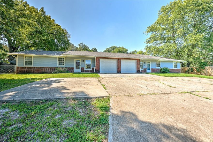 Exceptional Investment Opportunity – Turnkey Duplex Just Minutes from Downtown Siloam Springs! Don't miss this rare chance to own a fully occupied duplex just 3 minutes from the heart of downtown Siloam Springs. Each unit features 3 spacious bedrooms and 2 full bathrooms with durable hard-surface flooring throughout – perfect for low-maintenance living and long-term value. Enjoy peace of mind with a new roof and two separately fenced, oversized yards – ideal for tenants who want privacy or simply love the outdoors. Whether you're expanding your portfolio or stepping into your first income property, this duplex delivers immediate cash flow with reliable tenants already in place.  This is a prime opportunity in a rapidly growing area – act fast before it's gone!