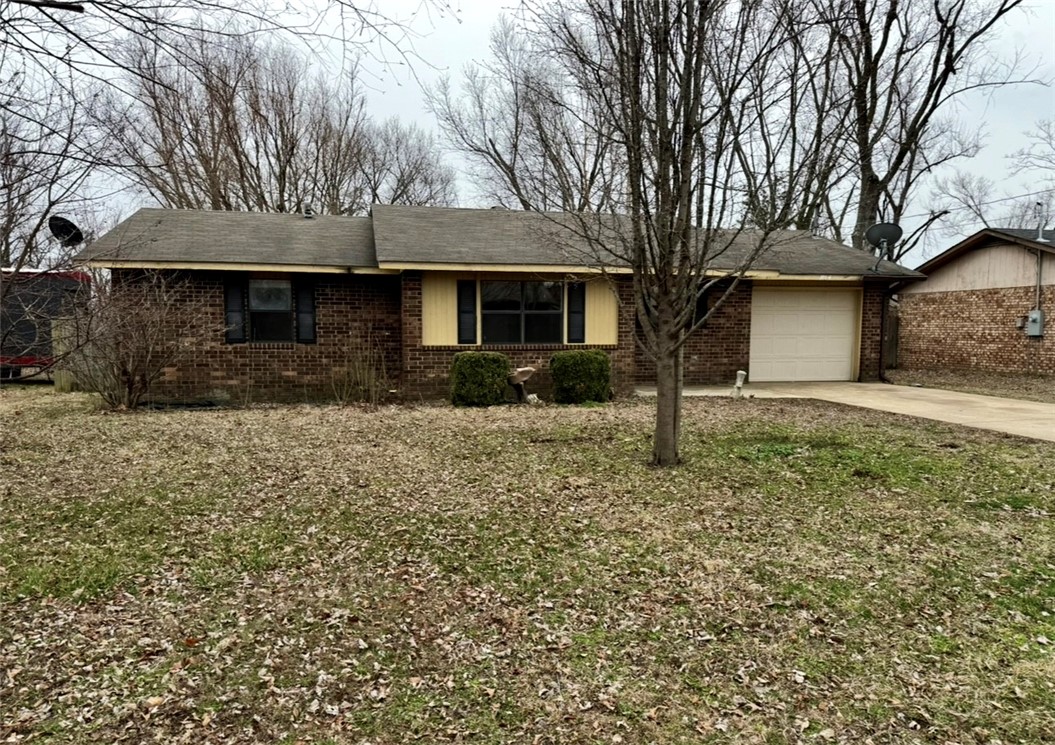 Located right next to the brand-new Walmart headquarters, this 3-bedroom, 1-bathroom home offers incredible potential! With 1,196 sq ft of living space, this property presents a fantastic opportunity for those looking to make it their own or investors seeking a prime location for future growth. The home is being sold as-is, providing you with the perfect canvas to personalize and renovate to your liking. Inside, you’ll find spacious rooms with ample natural light, ready for your vision. The kitchen, living room, and bedrooms are all generously sized, offering a comfortable foundation to create the perfect home. The large backyard offers plenty of space for outdoor activities, gardening, or even future expansions. The home's location is unbeatable, with easy access to major highways, shopping, dining, and, of course, the new Walmart headquarters, ensuring long-term value and convenience. This home is perfect for buyers ready to bring their creative ideas to life or anyone looking to capitalize on a booming area.