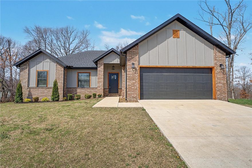 Welcome to this stunning home in Bella Vista, AR, where comfort, functionality, and beauty are seamlessly blended. This home boasts three spacious bedrooms and two full bathrooms, perfect for those who value space and convenience. The heart of the home is the spacious open layout, which is perfect for entertaining or simply relaxing after a long day. The cozy fireplace adds a touch of warmth and charm to the living area. The property also features a privacy fenced back yard, providing a secure and private outdoor space for you to enjoy. The home is situated on a huge corner lot, offering ample yard space for outdoor activities. Plus, it's just minutes away from the trails, making it an ideal location for those who love to explore the outdoors. This home is a must-see in Bella Vista, offering a blend of comfort, functionality, and beauty that is hard to resist.