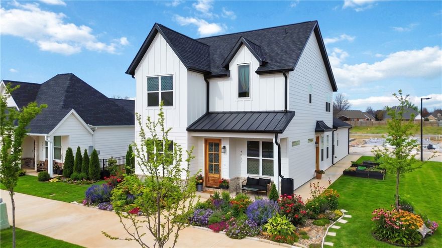 Better than new and fully dialed in, this 4 bedroom home with bonus room offers upgrades already completed—move-in ready with added value throughout.

The kitchen features GE Cafe appliances, gas range with vent hood, farmhouse sink, oversized island, and double drawer fridge, all opening seamlessly into the main living area.

The main-level primary suite includes dual vanities and a soaking tub, while secondary bedrooms are generously sized and flexible for guests, office space, or additional living. Updated LVP flooring and tile in 2025. Tankless water heater in place.

This home stands out with thoughtful upgrades already in place, including Speed Queen washer and dryer, epoxy-coated garage floor with wall storage, two EV chargers, sprinkler system, and established landscaping.

Located just minutes from Pleasant Grove Rd and the Pinnacle Promenade with easy access to shopping, dining, and everyday amenities.