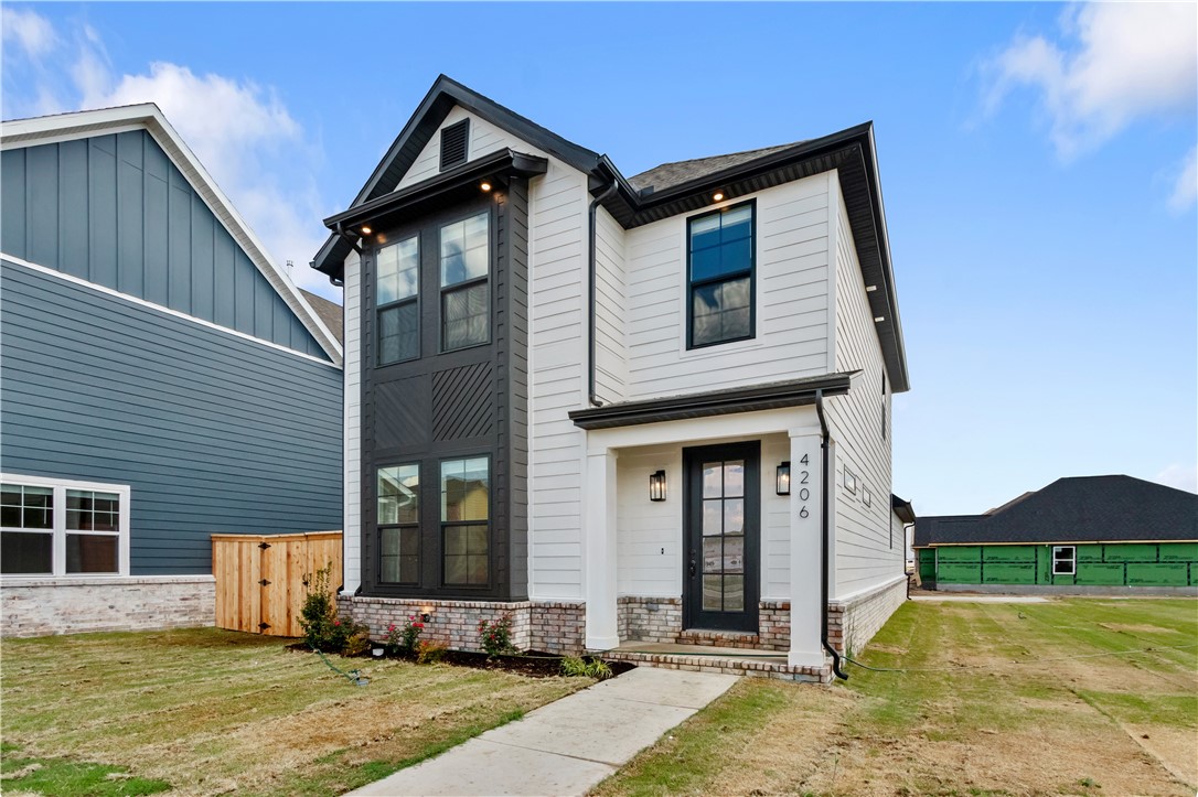 Be the first to live in this stunning new construction home. Open living space that flows into the kitchen and dining area. The kitchen includes a large island, pantry cabinet and GE stainless steel appliances. First floor also includes powder bath and mudroom. Upstairs are 3 bedrooms, including private primary suite with vaulted ceiling, bathroom with double vanities, walk-in shower and a large walk-in closet. The two guest bedrooms share full bathroom with double vanity. Apply online at www.NwaRentalHomes.com.